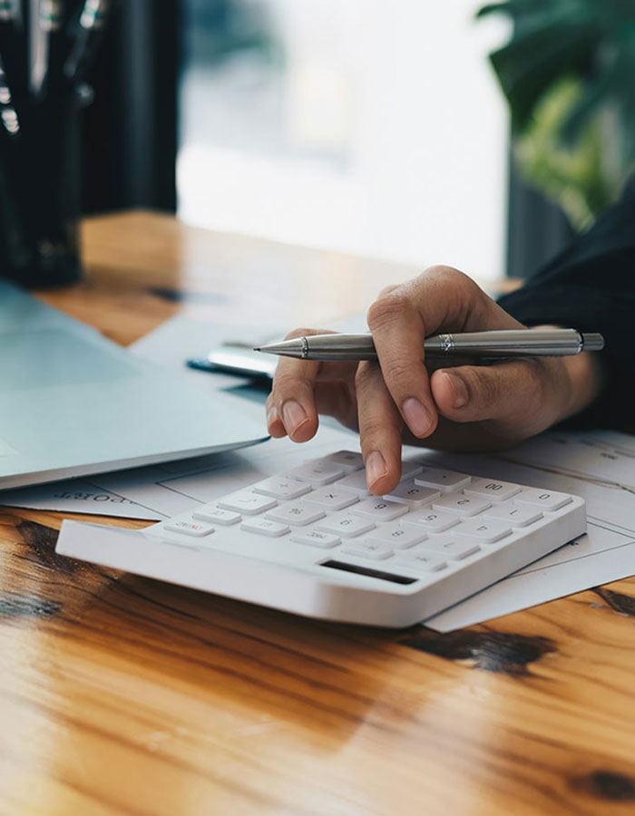 typing on calculator